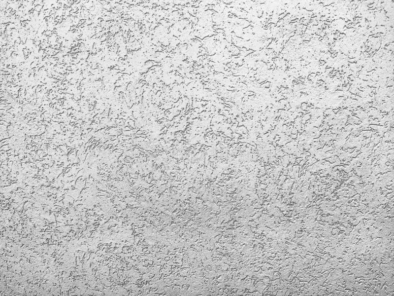 Texture of the grey plaster bark beetle on the wall. Seamless texture. The texture of the plaster is bark beetle on the wall. Seamless grey texture royalty free stock images